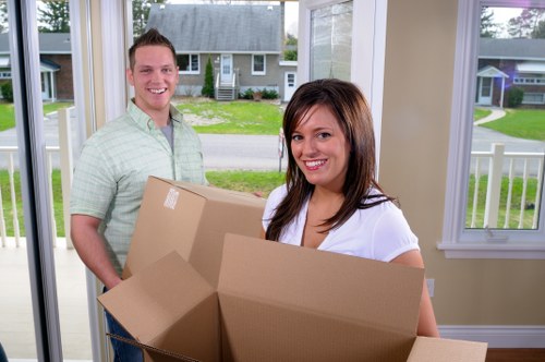 Professional removals team handling a Brompton home move