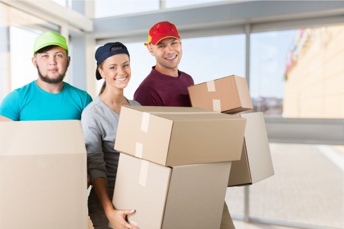Moving crew confirming booking details and inventory