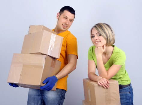 Packed moving boxes and household items ready for Brompton relocation