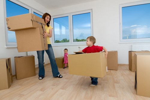 Careful loading of household items during a Brompton relocation